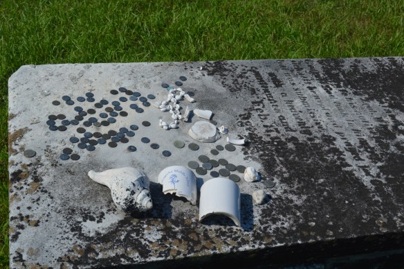 Hawaiian-themed mementos on Obookiah's gravesite.